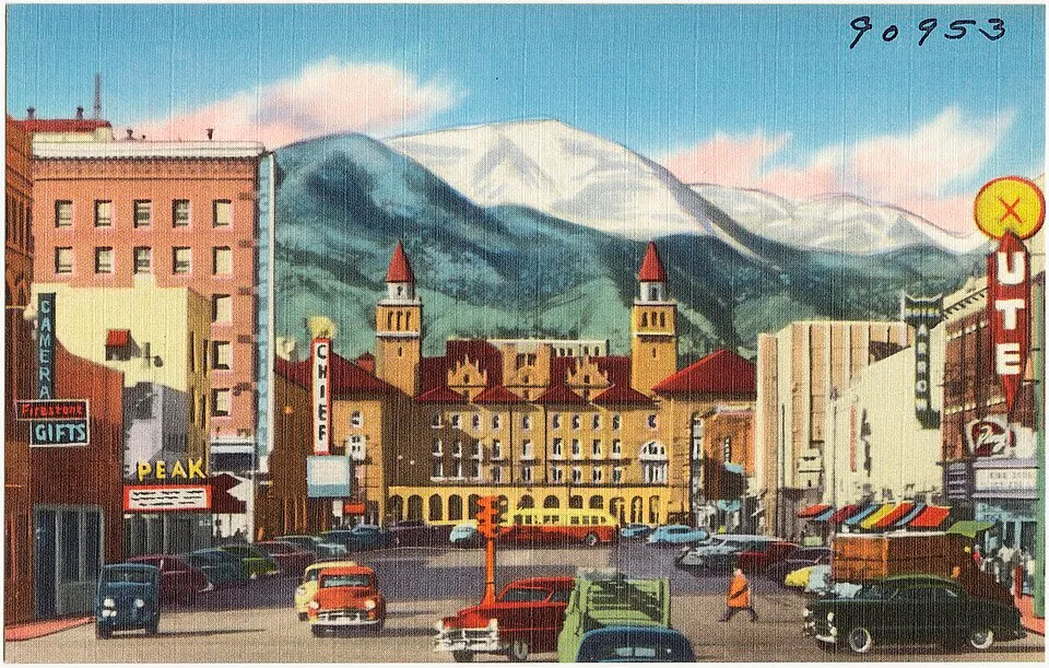 Historic downtown Colorado Springs with Pikes Peak rising behind the city